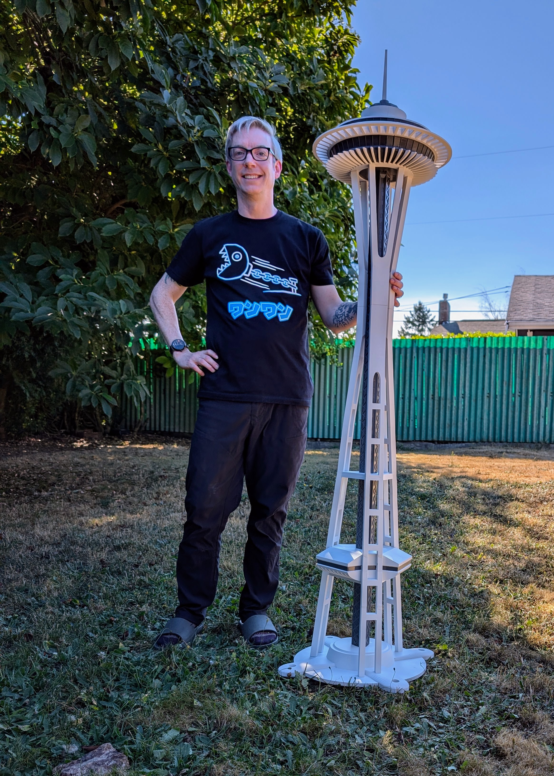 Nathan with a 5.5-foot 3D printed Space Needle.